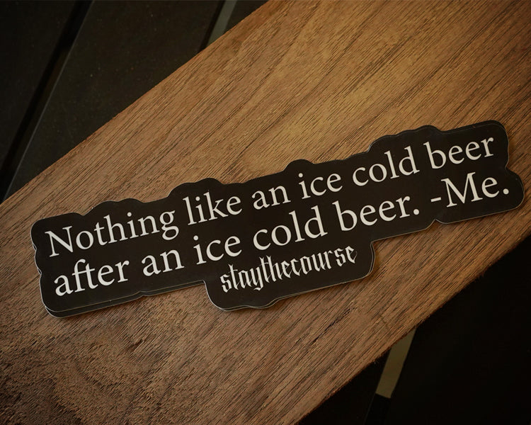 Wood with humorous quote about ice cold beer on a wooden surface