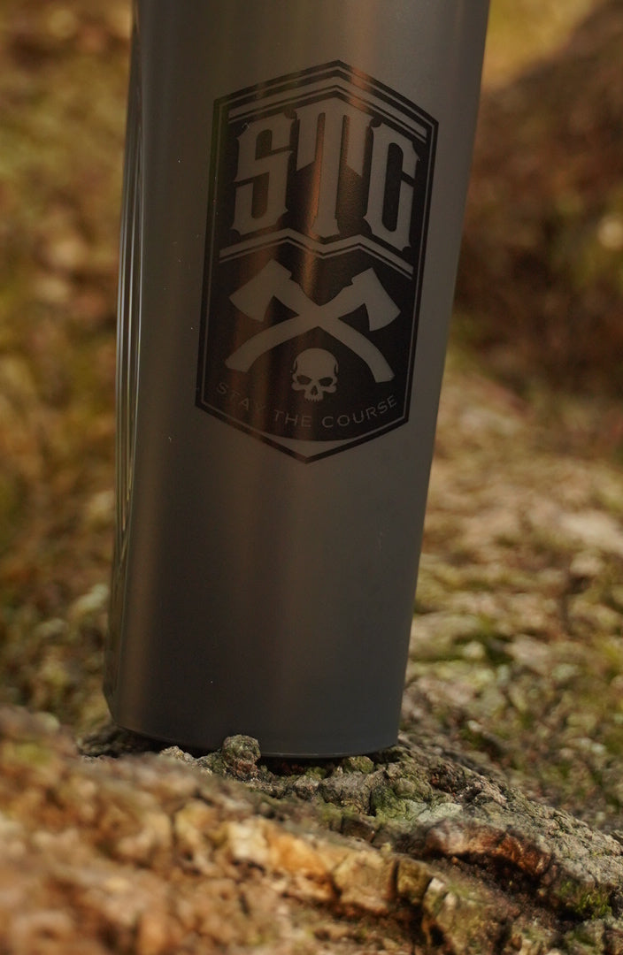 Black blender bottle against tree background