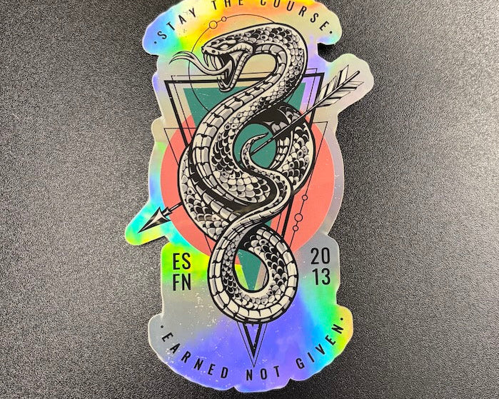 Holographic sticker with snake design on a black background