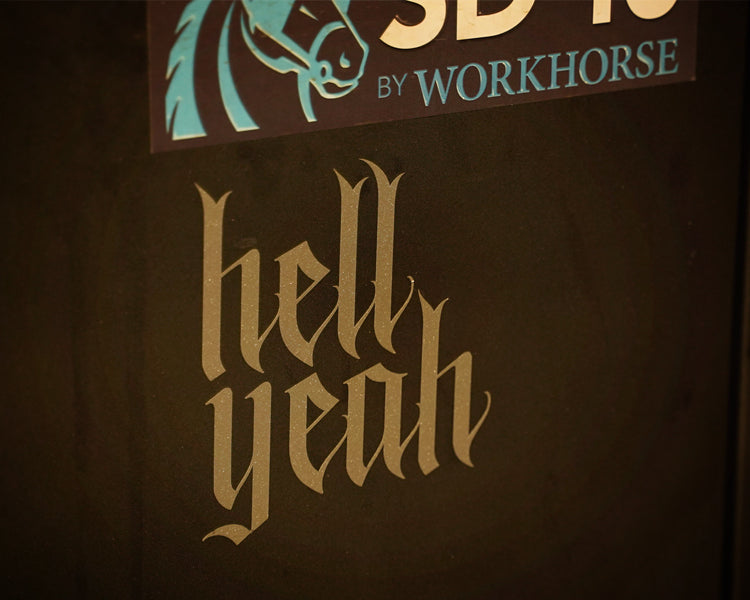 silver sparkle vinyl decal that reads hell yeah