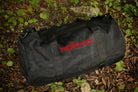 Legend Duffle Bag / Black Camo on ground