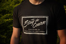 Person wearing a black t-shirt with 'Stay the Course Clothing Co' logo.
