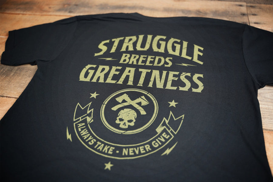 Black t-shirt with 'STRUGGLE BREEDS GREATNESS' 'ALWAYS TAKE NEVER GIVE' text and green graphics, featuring axes and a skull, on the front and back.