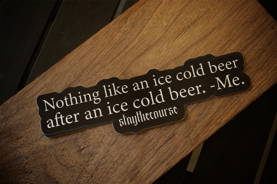 Wood with humorous quote about ice cold beer on a wooden surface