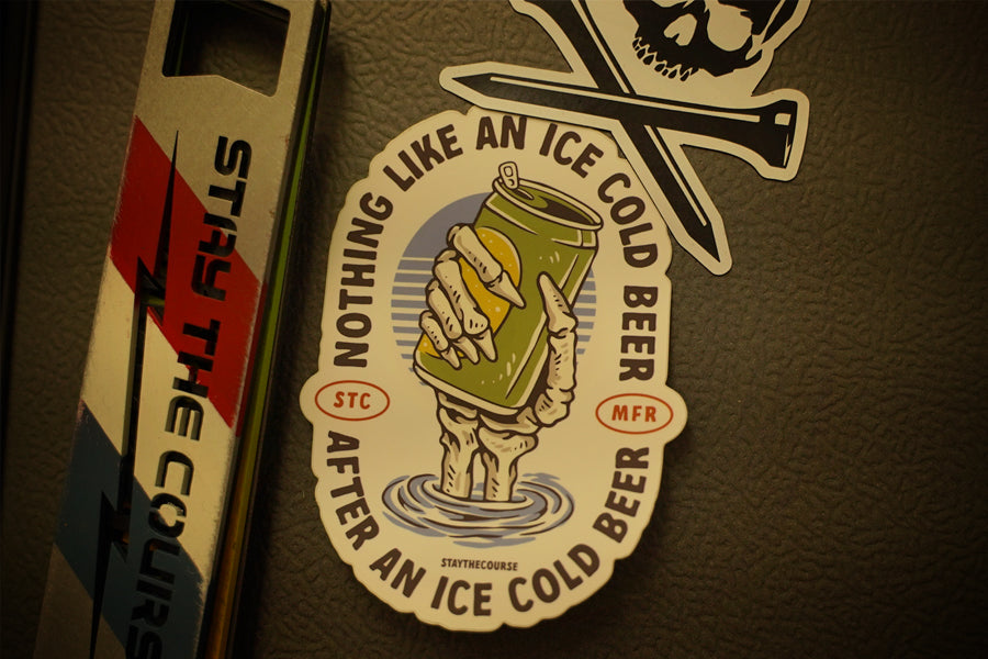 A sticker that says Nothing like an ice cold beer after a nice cold beer, with a skeleton hand holding a beer can. 