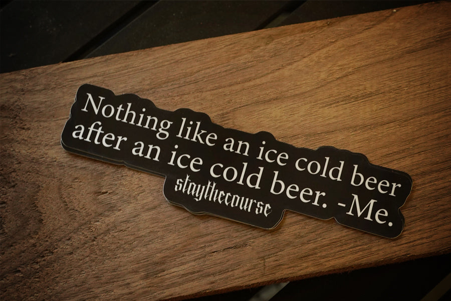 Sticker with humorous text on a wooden surface