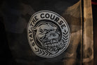 Black Camouflage fleece pants with a graphic of a panther and 'Stay the Course' text on a dark background