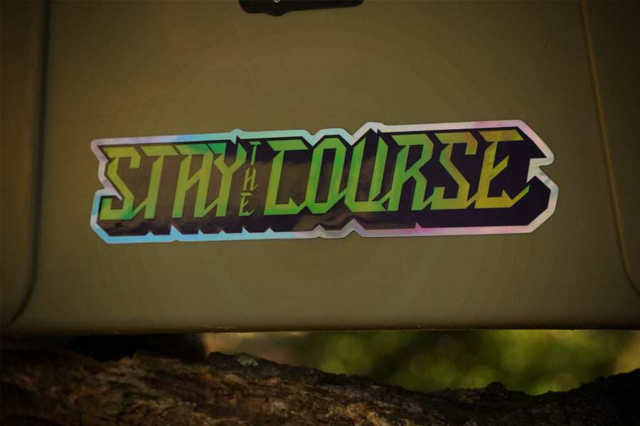Sticker with 'Stay Course' text on a beige background
