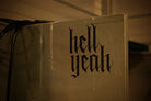 Flat black vinyl decal that reads hell yeah